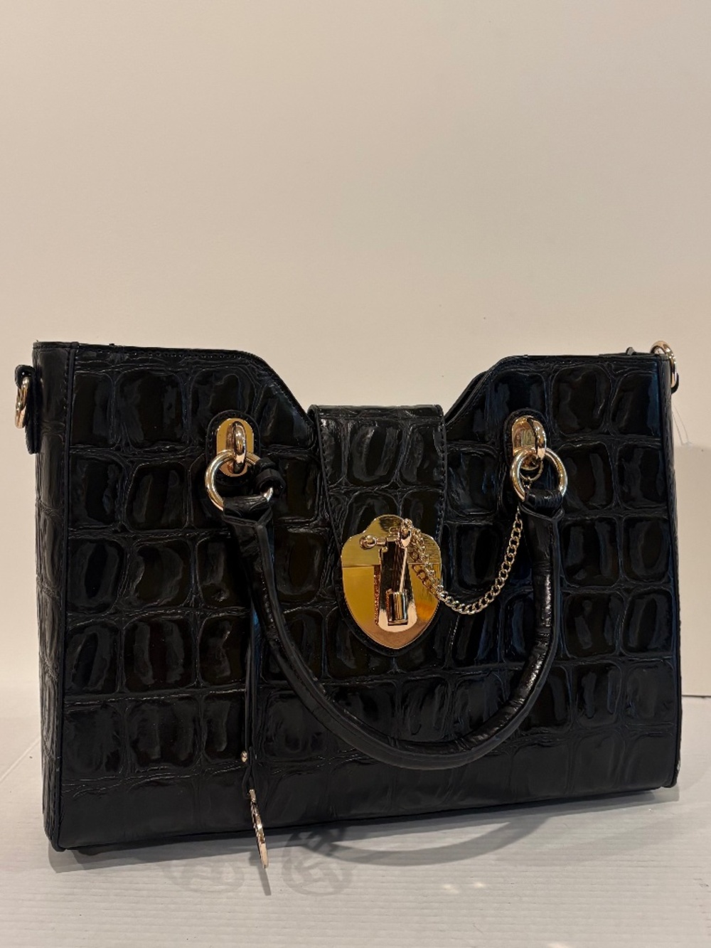 NEW W/TAG - SUPERIOR QUALITY  EMBOSSED LEATHER BAG